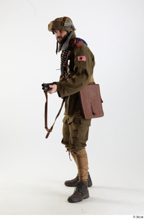 Owen Reid WWII Army Pose aiming gun aiming gun standing…
